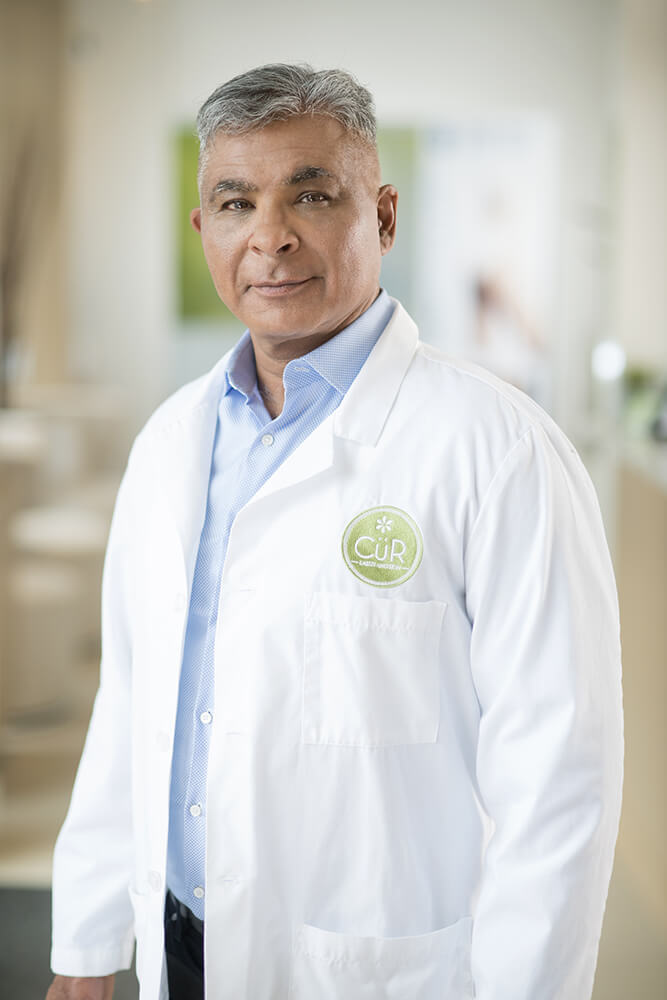 portrait of CüR Laser & Skin's medical director, Dr. Kumar Shivdasani